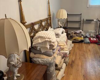 Vintage gold gilded headboard and vintage linens