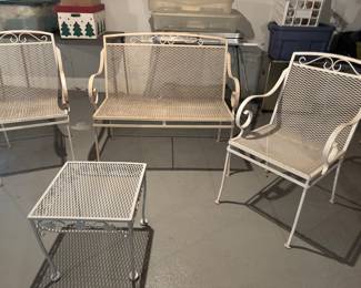 Outdoor wrought iron loveseat chairs and coffee table ( possible Woodward )