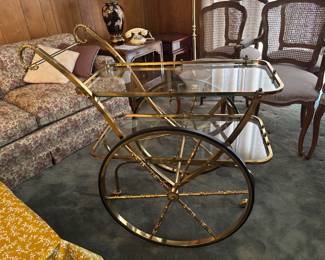 Vintage brass rolling liquor cart