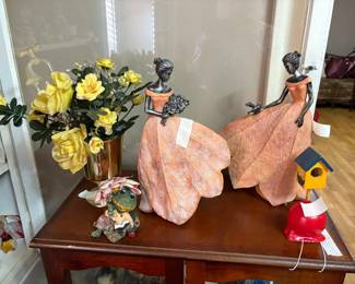 Collectibles on top of Small Cabinet in Living Room