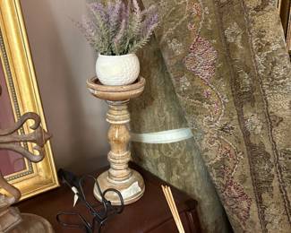 Several area rugs in corner of living room