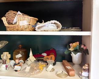 Top - baskets; bottom has various flower pots, miniature guitar in case + more!