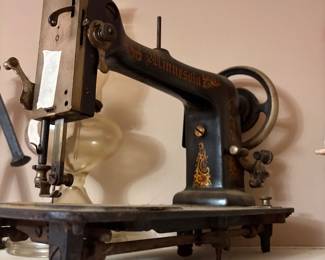 Very old vintage crank sewing machine