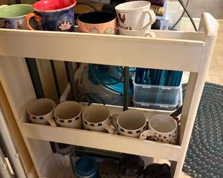 Moveable tiered cart with coffee cups