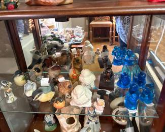 Collectibles in cabinet in Living Room