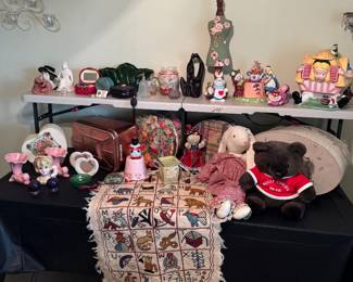 vintage Kashmiri chain-stitch wool alphabet and number wall hanging featuring whimsical hand-embroidered animal motifs and fringed edges., vintage mid-century pink ceramic cornucopia (horn of plenty) vase/planter by Cameron Clay Products, vintage ceramic lady head vase by Nancy Pew, vintage handmade country rag doll bunny, corporate promotional plush bear distributed by the former investment bank Bear Stearns, candle warmer, salt n pepper shakers, vintage-style miniature tabletop decorative dress form mannequin, vintage black soapstone "Family" abstract sculpture, perfume bottles, Disney Alice in Wonderland Mad Tea Party Ceramic Teapot Set, Disney Store "Alice Stuck in the White Rabbit's House" ceramic cookie jar