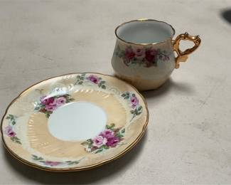 Rose-Decorated Porcelain Cup and Saucer (5/6)