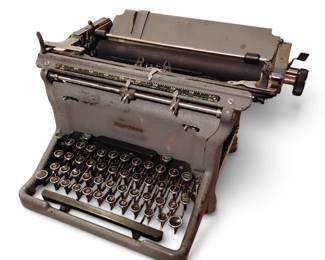 OLD TYPEWRITER. NEEDS OILED