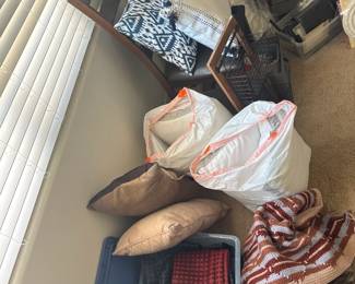 Assorted Pillows And Bedding