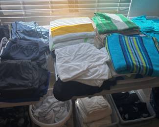 Striped Towels And Folded Clothing