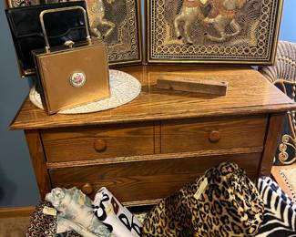 Small antique chest with Burmese pictures.