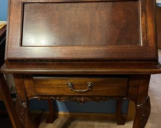 Drop front desk with interior light.