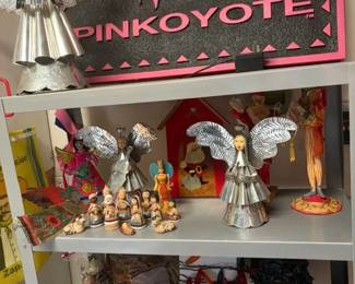 Holiday decor and Pinkoyote sign