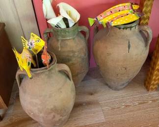 Large rustic ceramic jars with Jim Wagner painted and carved fish, etc