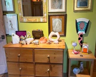Vintage rustic chest with collection of Native American stone carvings