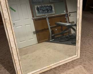 large marble-framed mirror