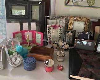 Various photo frames and collectibles