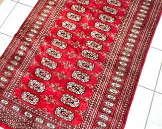 Bokhara-Style Red Wool Area Rug with Elephant-Foot Gul Motif & Fringe