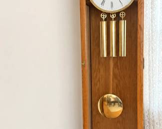 Howard Miller Oak Triple-Chime Grandfather Floor Clock with Brass Pendulum & Roman Numeral Dial