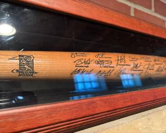 MLB Players Choice bat in glass case with etched signatures