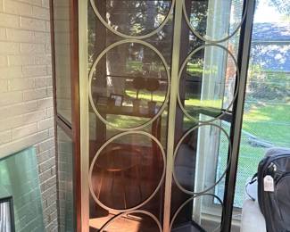 Another view of the glass curio cabinet - lit - with glass shelves