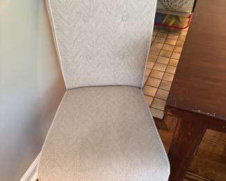 Another view of the dining table side chairs (5 available)