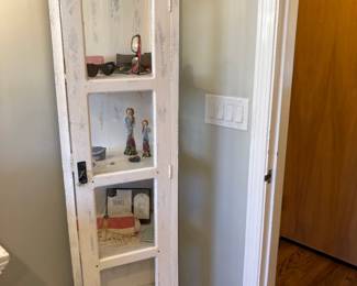 Tall curio cabinet with glass and wood shelves 