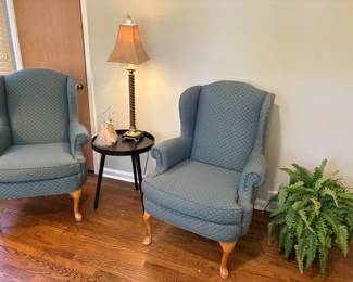 Armchairs - matched set, shown with side table and lamp, decor and faux fern