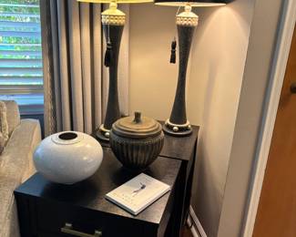 Matched set of side tables/nightstands with center drawer and lower tier - black, pottery, and matched set of buffet lamps