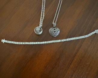 Costume Jewelry:  Tennis bracelet and sterling silver necklaces