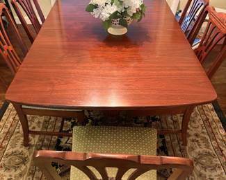 Dining table with leaf and pads, and 6 charis (2 arm and 4 side)