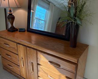 Oak dresser with 6 drawers and cabinet, mirror, lamp and faux fall decor