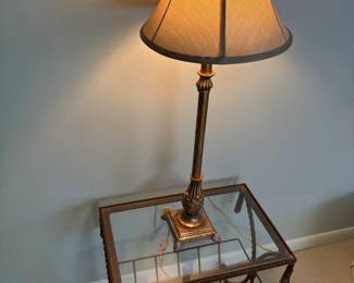 metal side table/magazine rack with glass top and metal lamp