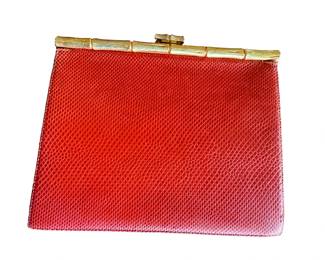 Snakeskin strap clutch