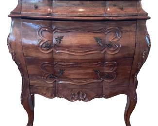 One of a pair of walnut commodes