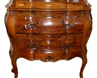 One of a pair of walnut commodes