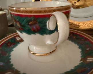 Christmas motif teacup and saucer with gold trim