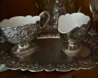 Silver plate cream and sugar set with floral repousse tray