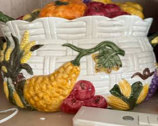 Ceramic basket-weave bowl with raised fruit and corn motif