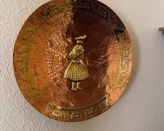 Hammered copper wall plate with brass Greek soldier figure