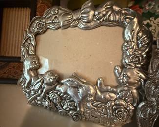 Silver-tone pewter picture frame with rabbits and rose bow detail