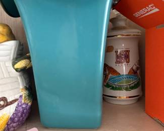 Turquoise ceramic fan-shaped vase with gold rim trim