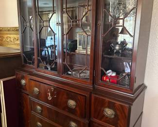 Mahogany china cabinet with mullioned glass doors and drawers