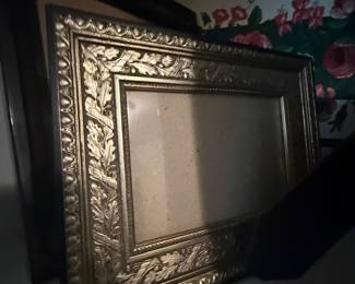 Ornate gilt frame with acorn and oak leaf relief detail