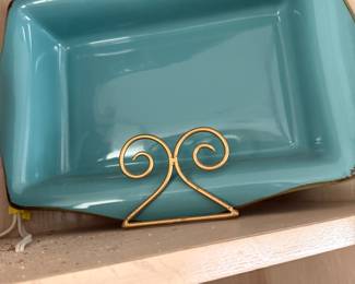 Turquoise ceramic rectangular dish on gold scroll display stand