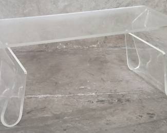 145 Umbrastyke acrylic coffee table with magazine