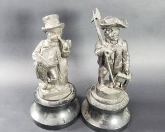 607 Pair of antique spelten statues on wood bases