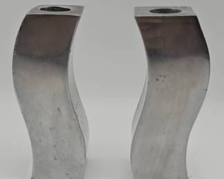 514h Pair of modernist curved metal candleholders