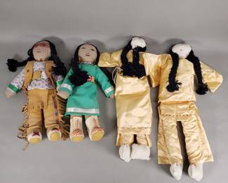 549 4 Native American leather and fabric dolls