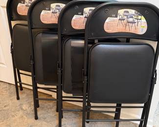 Brand new folding chair set of 4